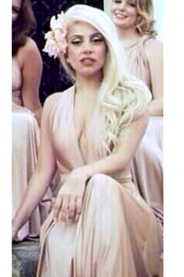 Lady Gaga Toned Down Her Glam in A Soft Cream Dress, 2013
