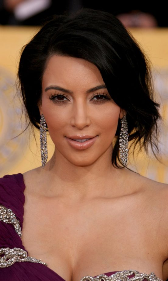 Kim Kardashian's Glam Updo Hairstyle Is Polished Off With Her Statement Earrings, 2011