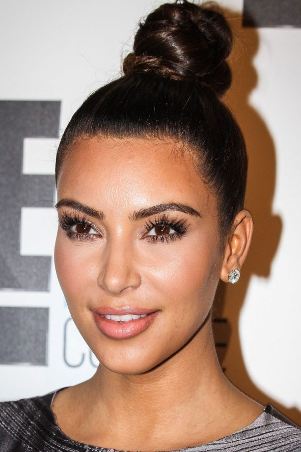 Kim Kardashian Works A Sleek Topknot Hairstyle For An E! Channel Event, 2012