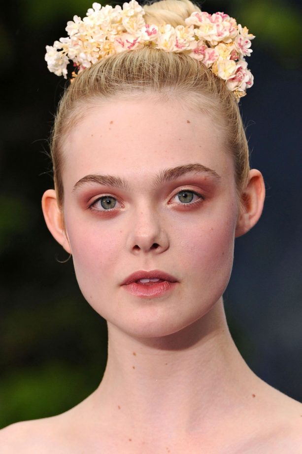 Elle Fanning Works A Floral Hair Accessory For A 'Maleficent' Event, 2014