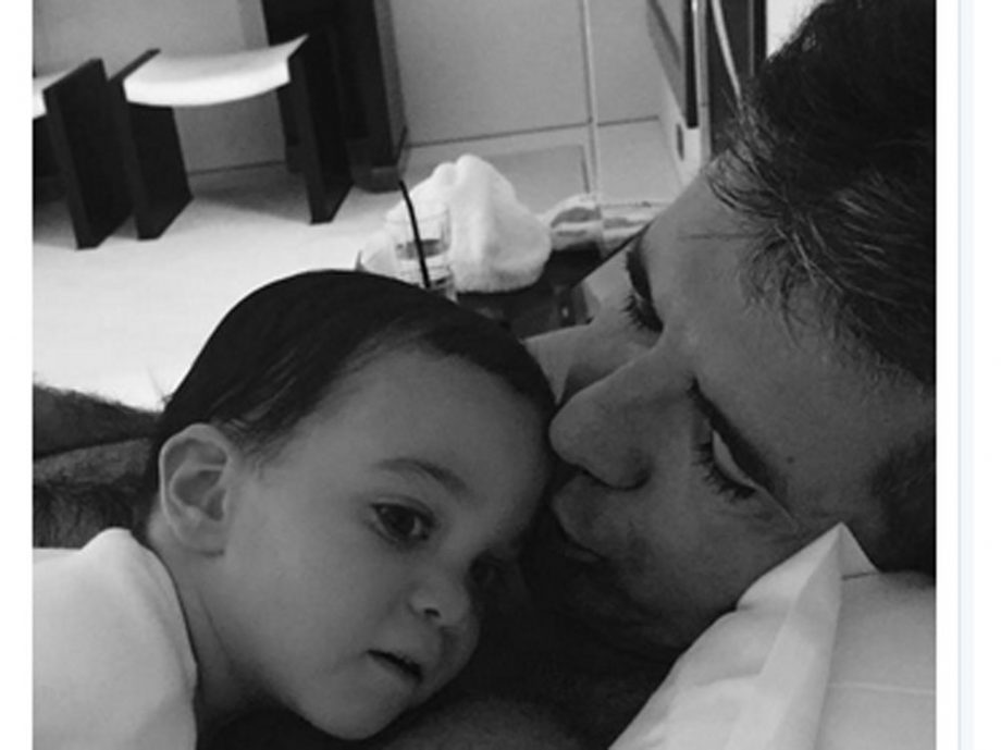 Simon Cowell Cuddles With Son Eric For Father's Day, 2015