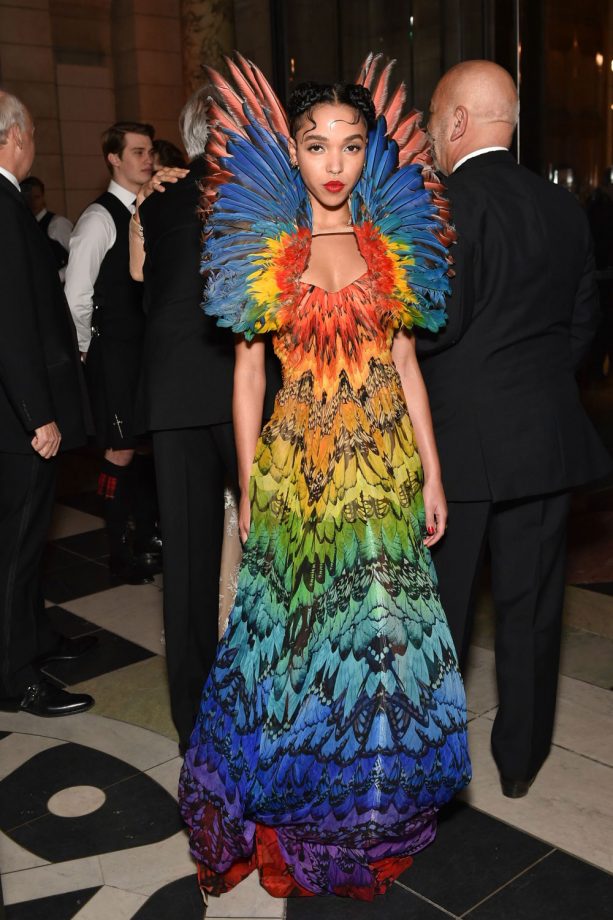 FKA's Decision To Wear An Ornate Alexander McQueen Feathered Rainbow Dress To The Alexander McQueen: Savage Beauty Fashion Benefit Dinner At The V&A Was Inspired, 2015