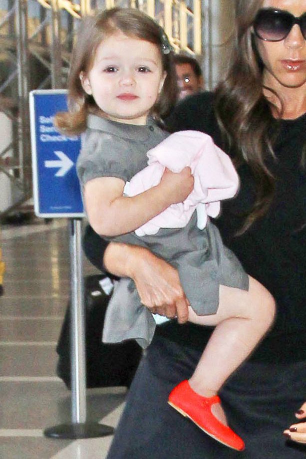 Harper Beckham Making A Statement Pair Of Red Mary Jane's Work With A Grey Dress, 2013