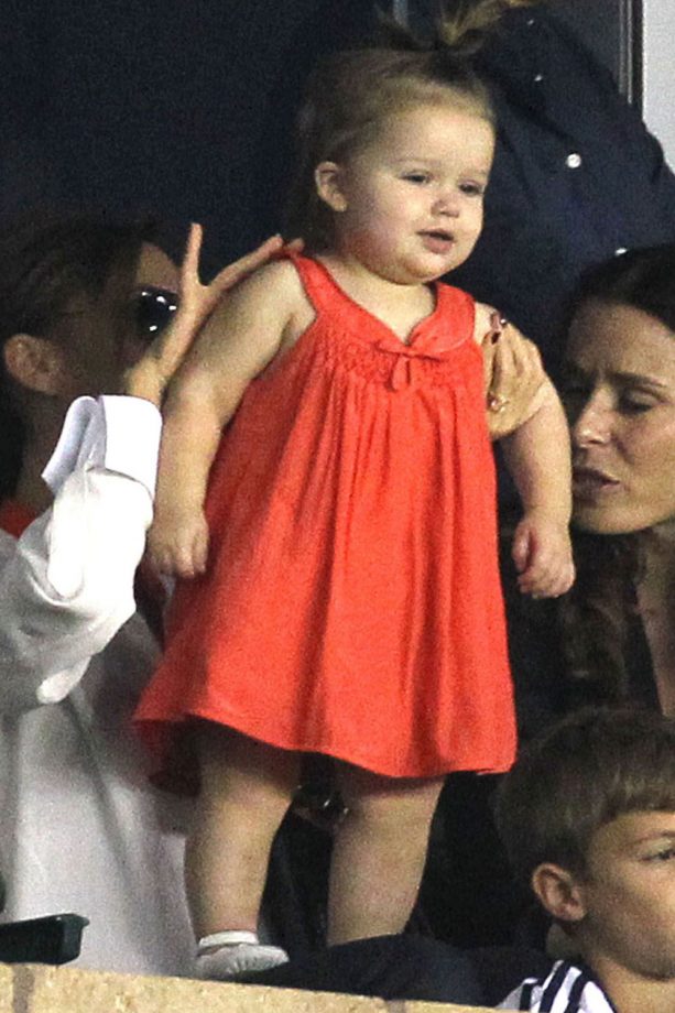 Harper Beckham Enjoying The Football In Her Red Summer Dress, 2012