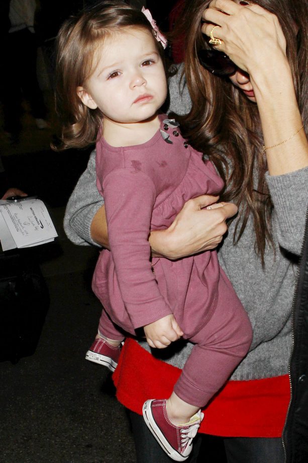 Harper Beckham With Her Staple Converse At The Airpoport With Mum Victoria Beckham, 2012