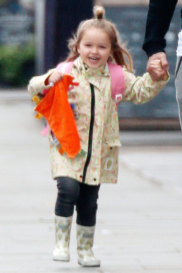 Harper Beckham Doing A Print Mash Up With Wellies And A Rain Mac, 2015