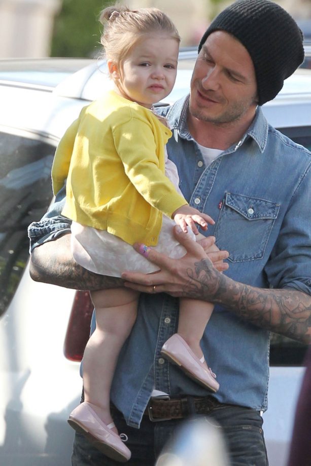 Harper Beckham Rocking A Yellow Cardigan On A Stroll Out With Dad David Beckham, 2013