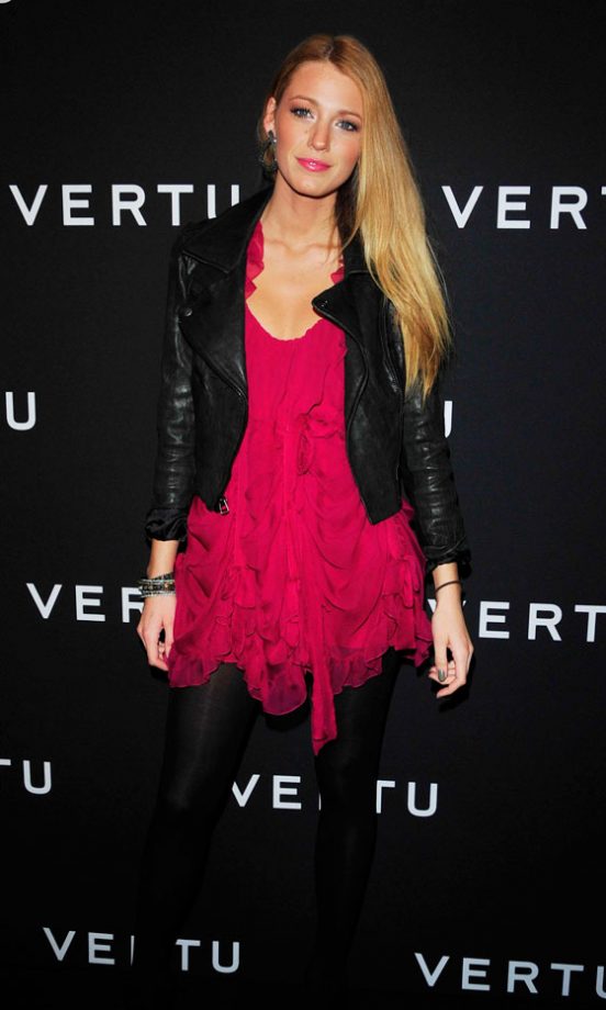 Blake Lively Toughens Up A Burgundy Christian Dior Ruffled Dress With A Cropped Leather Jacket At The Vertu Smartphone Launch Party, October 2010