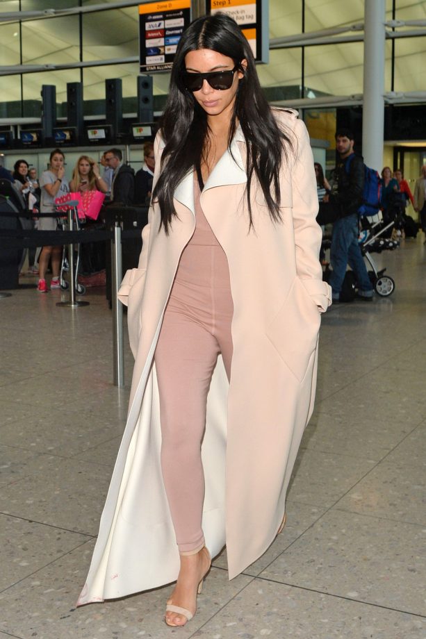 Kim Kardashian Wears A Pink Unitard To Heathrow Airport, 2015