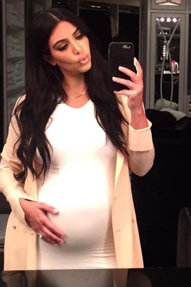 Kim Kardashian Dresses Her Bump In A Form-Fitting Dress, 2015