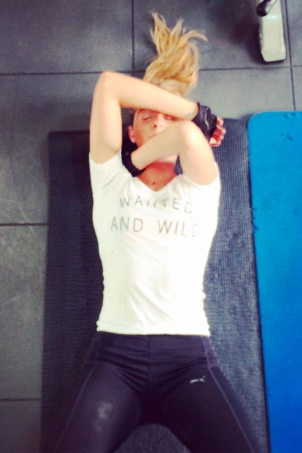 Millie Mackintosh Wears A Slogan T-Shirt With Black Leggings To Workout, 2015