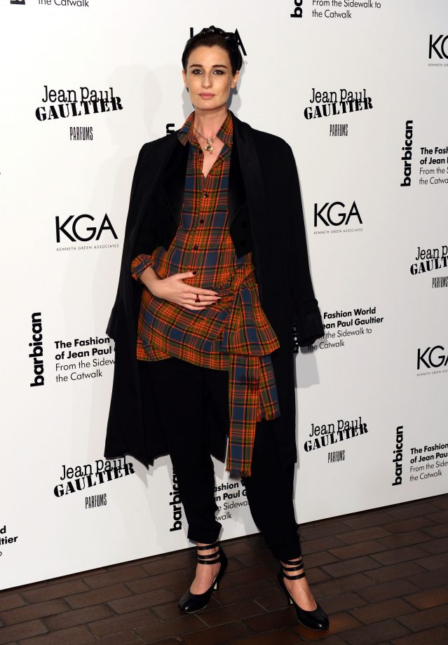 Erin O'Connor Cradles Her Bump In Checks At A Jean Paul Gaultier Art Show In London, 2014