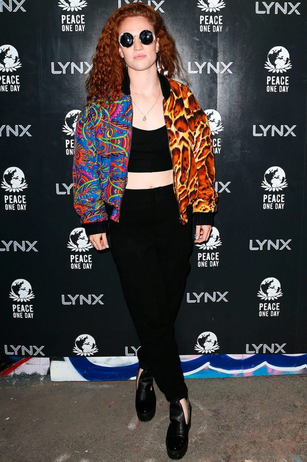 Jess Glynne Shows Her Quirky Side In A Contrasting Print Bomber Jacket At An Event In London, 2014