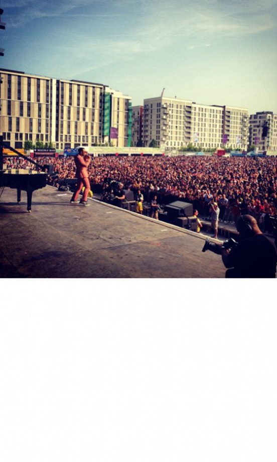 John Legend Belts Out A Tune In His Salmon Pink Suit At Wireless, 2013