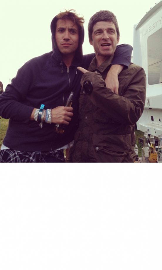 Noel Gallagher Gives Nick Grimshaw The (Friendly) Finger Backstage At Glastonbury, 2013