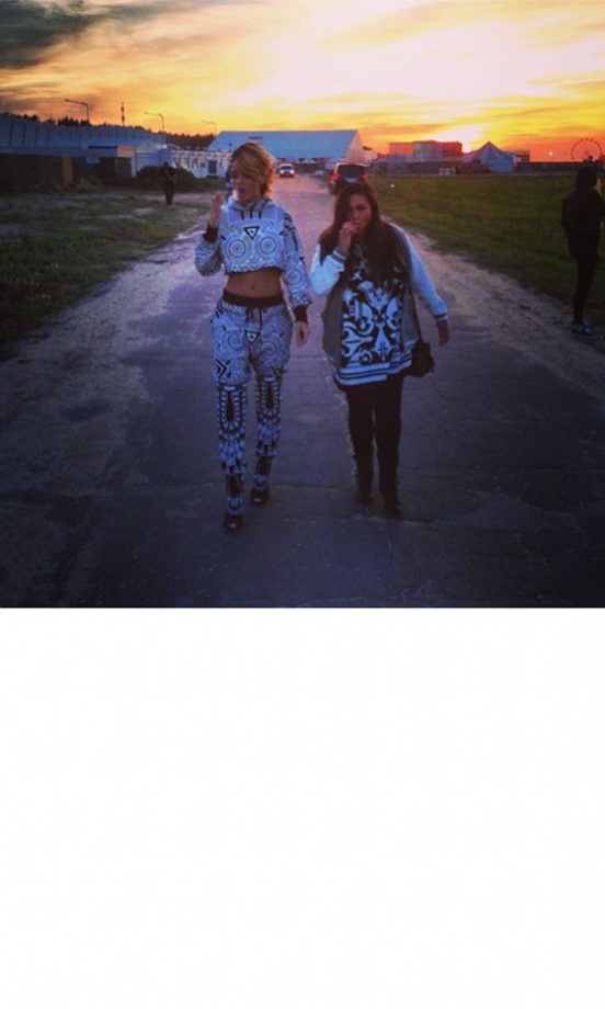 Rihanna Takes A Sunset Walk With A Pal Backstage At Heineken Open'er Festival In Poland, 2013