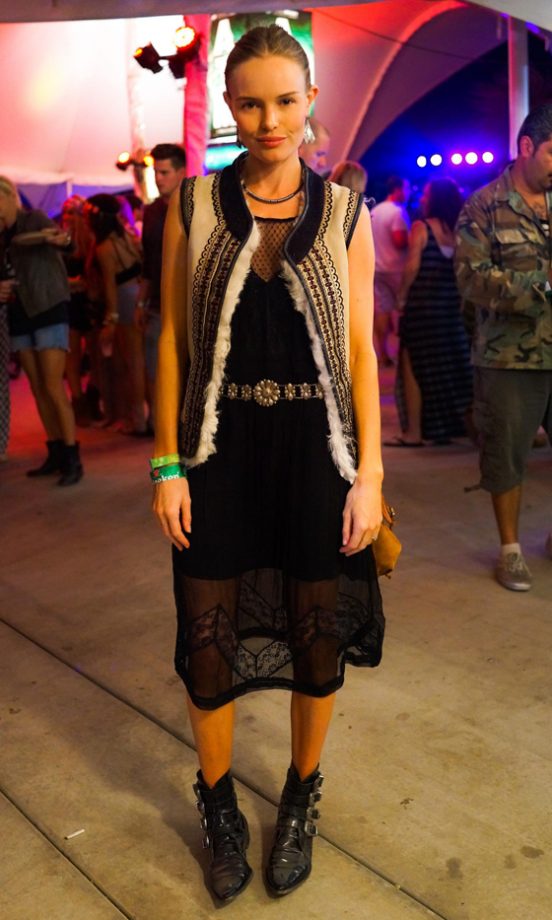 Kate Bosworth Rocks Up Her Sheer Black Dress With A Fleece Lined Gilet From Her Exclusive Topshop Collection At Coachella, 2013