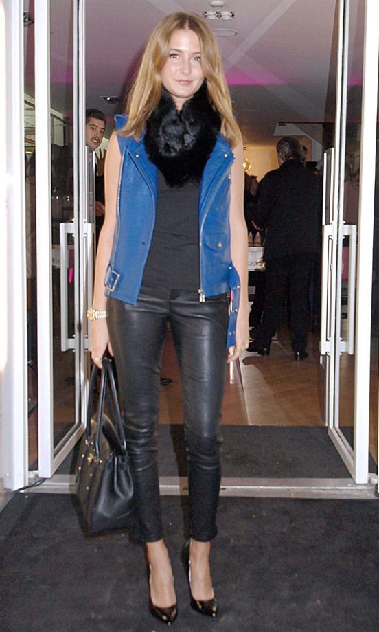 Millie Mackintosh Mixes Coloured Leather In With Her All Black Outfit By Slipping Over An Electric Blue Gilet By Supertrash, 2013