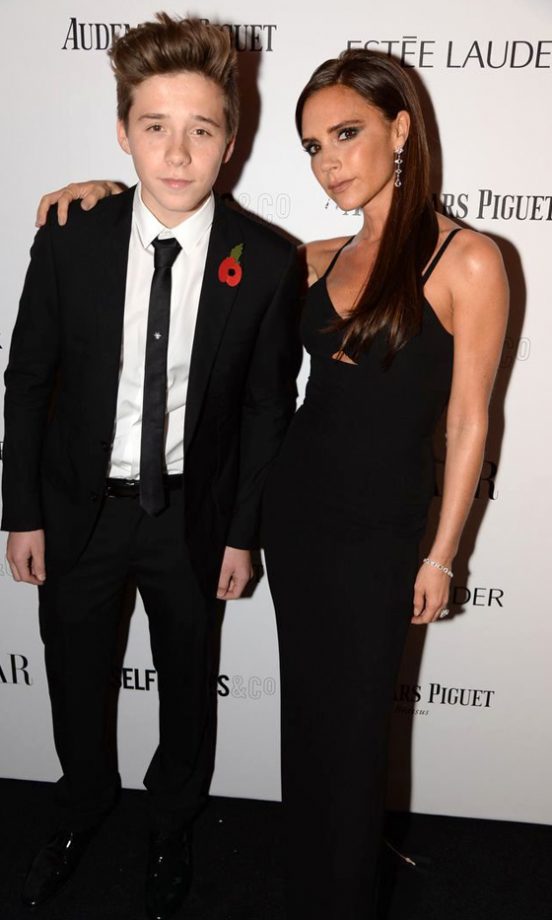 Brooklyn Beckham Stands Tall With Mum Victoria At The Woman Of The Year Awards In London, 2013