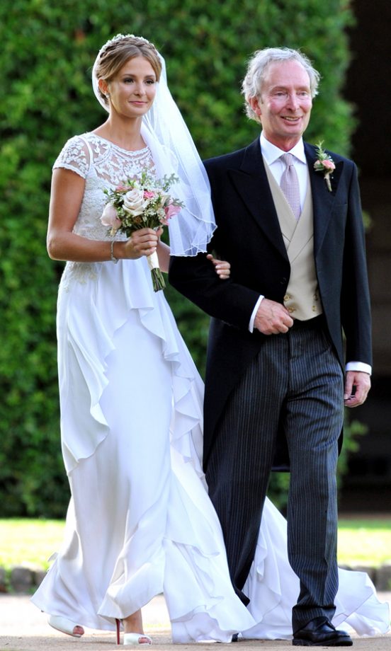Millie Mackintosh Wearing A Vintage Alice Temperley Wedding Dress As She Walks Towards Professor Green, 2013