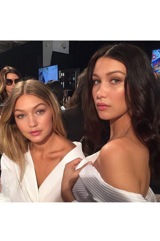 Sisters Bella And Gigi Hadid Getting Their Make-Up Done Backstage At Tommy Hilfiger
