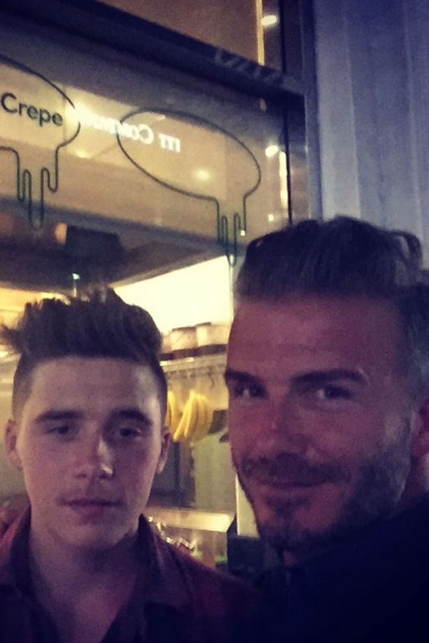 Brooklyn And David Beckham Enjoy A Snack Together, 2015