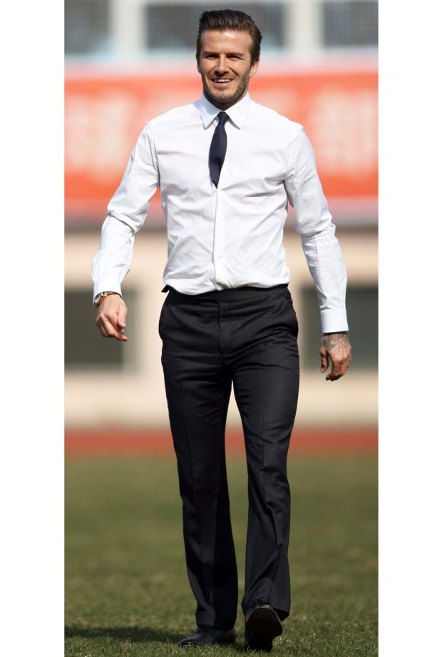 David Beckham Is The Only Man Who Looks This Good In A Suite On A Footbal Pitch, 2013