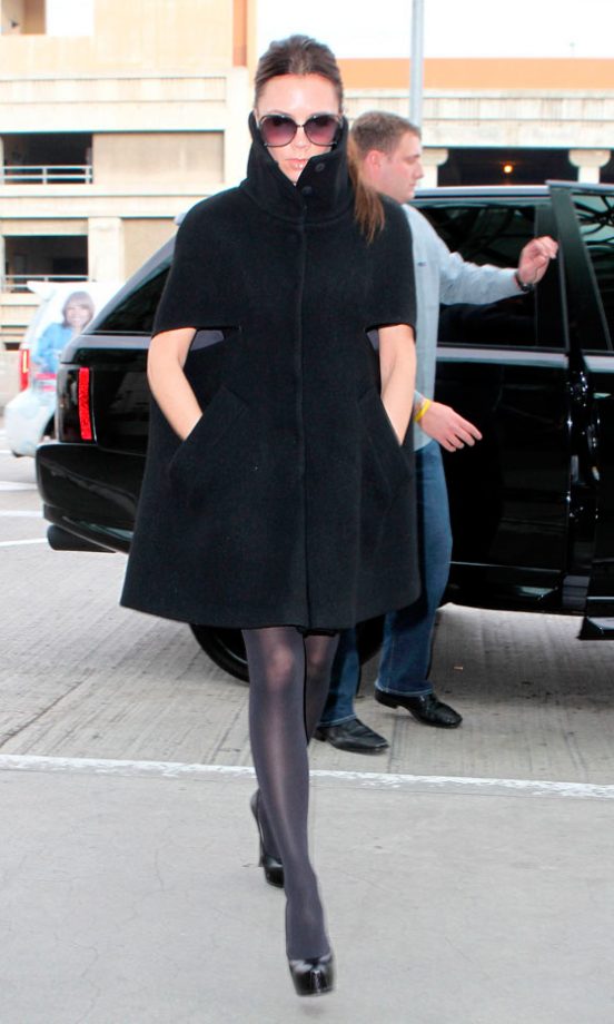 Victoria Beckham Covers Up In A Giambattista Valli Coat At LAX Airport, December 2010