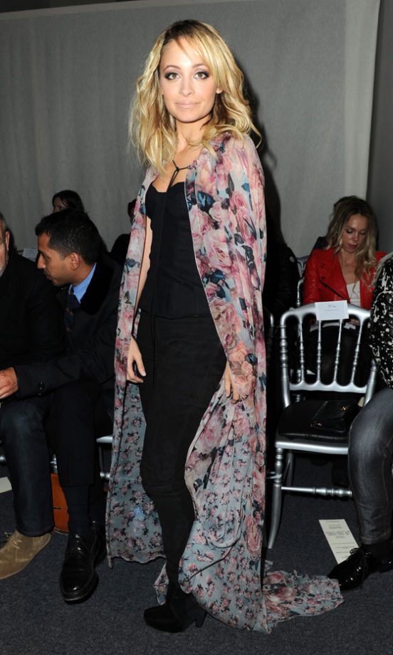 Nicole Richie Wearing A Jean Paul Gaultier Cape At The Label's AW11 Show At Paris Fashion Week, March 2011