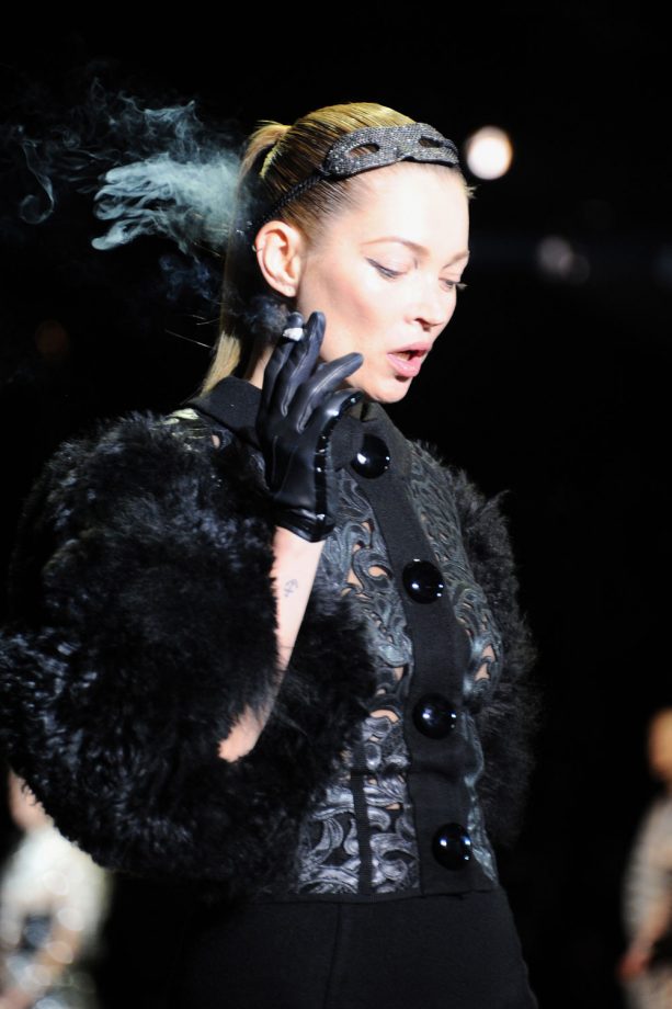Kate Moss Pocking Fun At The Smoking Ban By Lighting Up On The Louis Vuitton Catwalk, 2011