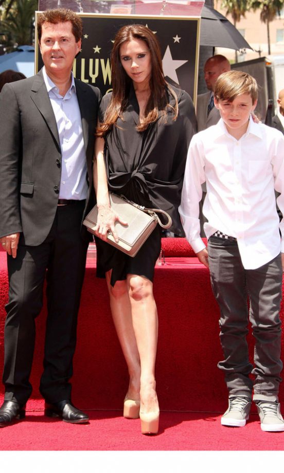 Victoria Beckham Disguised Her Growing Baby Bump In A Dress From Her S/S11 Collection, May 2011
