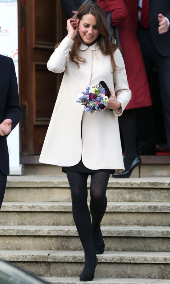 Kate Middleton, Duchess Of Cambridge, Wears A Cream Wool Coat By Goat To Visit The Child Bereavement Centre Offices In Saunderton, 2013