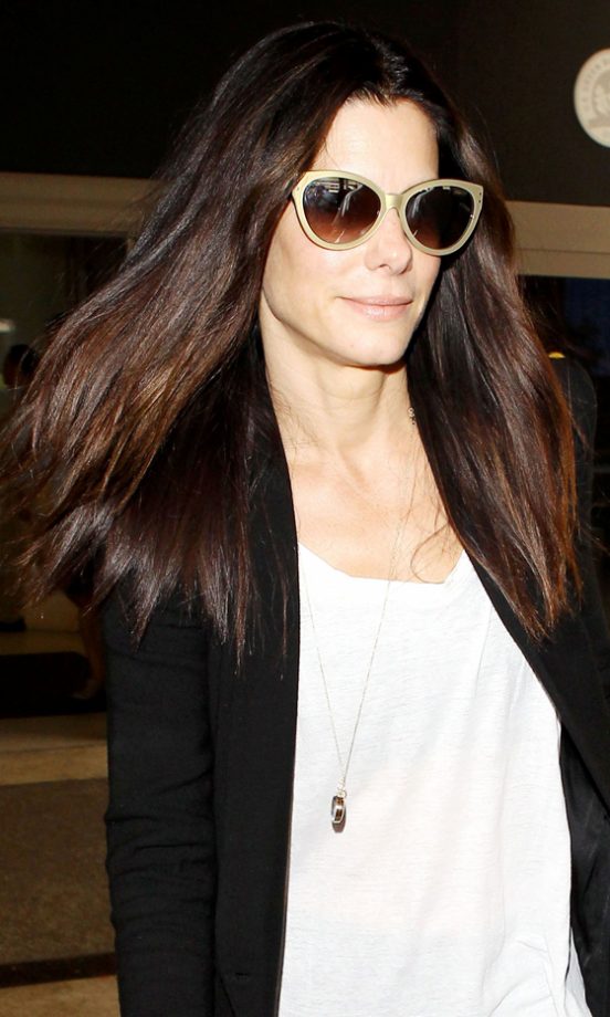 Sandra Bullock Shows Off Her Long Brown Locks At LAX Airport, 2013