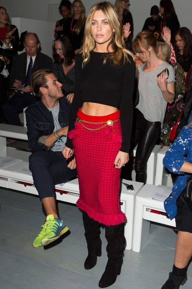 Abbey Clancy Shows Off Her Washboard Abs In A Textured Midi Skirt And Crop Top During London Fashion Week, 2014
