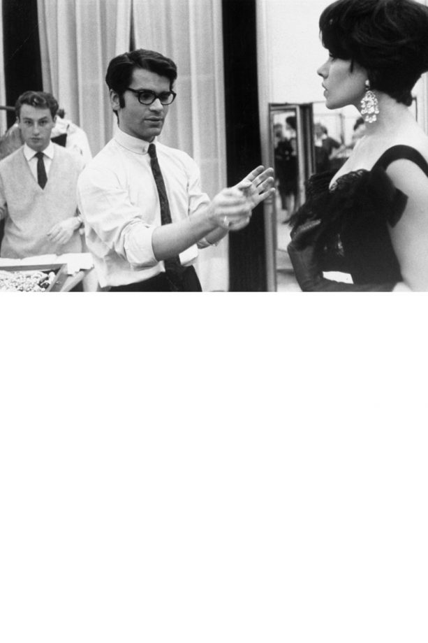Karl Lagerfeld During A Fitting With A Model, 1964