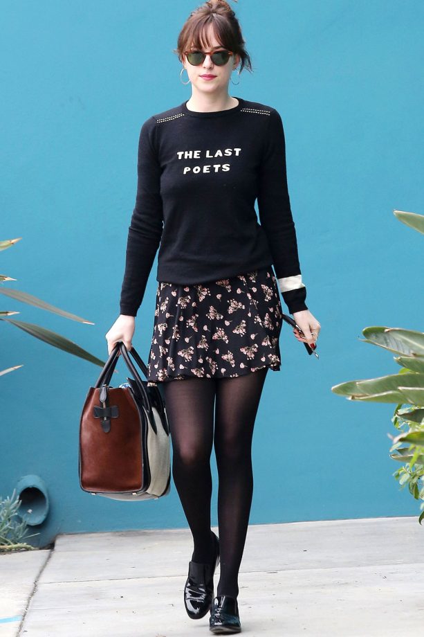 Dakota Johnson Teams A Statement Jumper With A Floral Skirt Out And About In LA, 2015