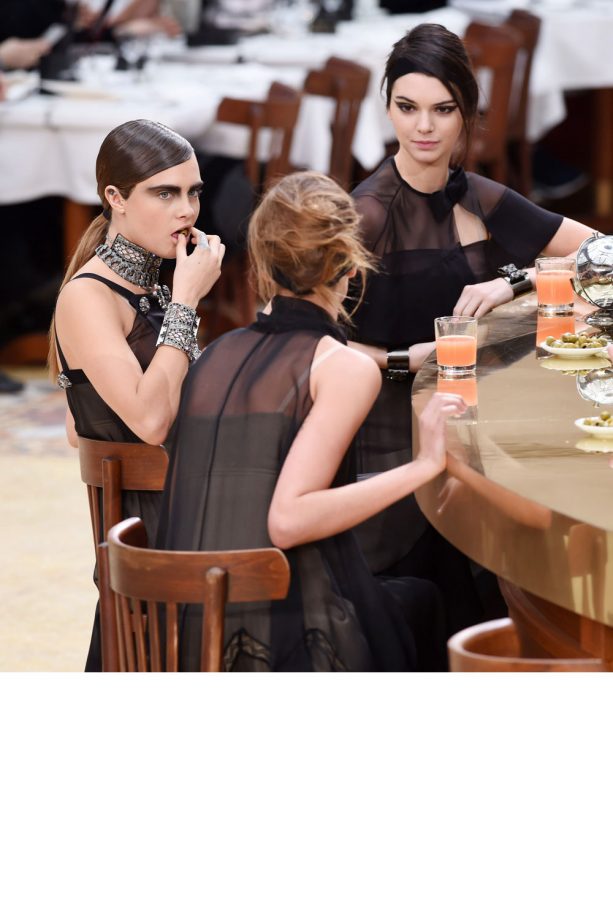 Cara Delevingne And Kendall Jenner Run The Chanel AW15 Show In Paris, 2015