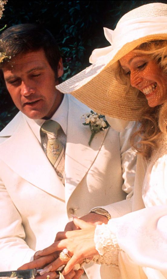 Charlie's Angels Beauty Farrah Fawcett And Lee Majors Cut The Cake At Their Wedding, July 1973