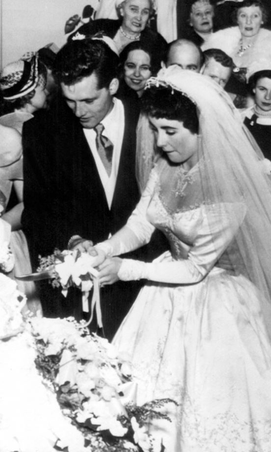 Elizabeth Taylor Cuts The Cake At Her Wedding To Nicky Hilton, 1950