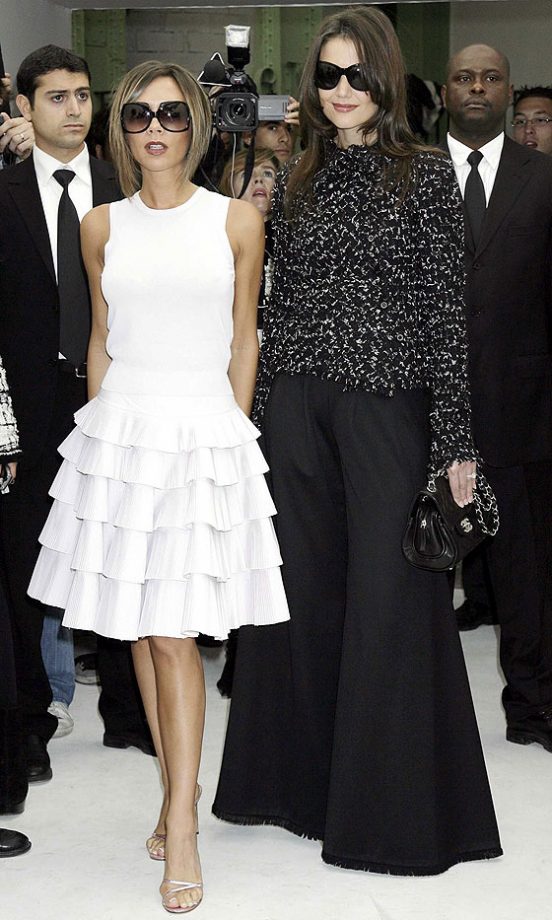 Victoria Beckham With Katie Holmes At The Chanel Show During Paris Fashion Week, 2006