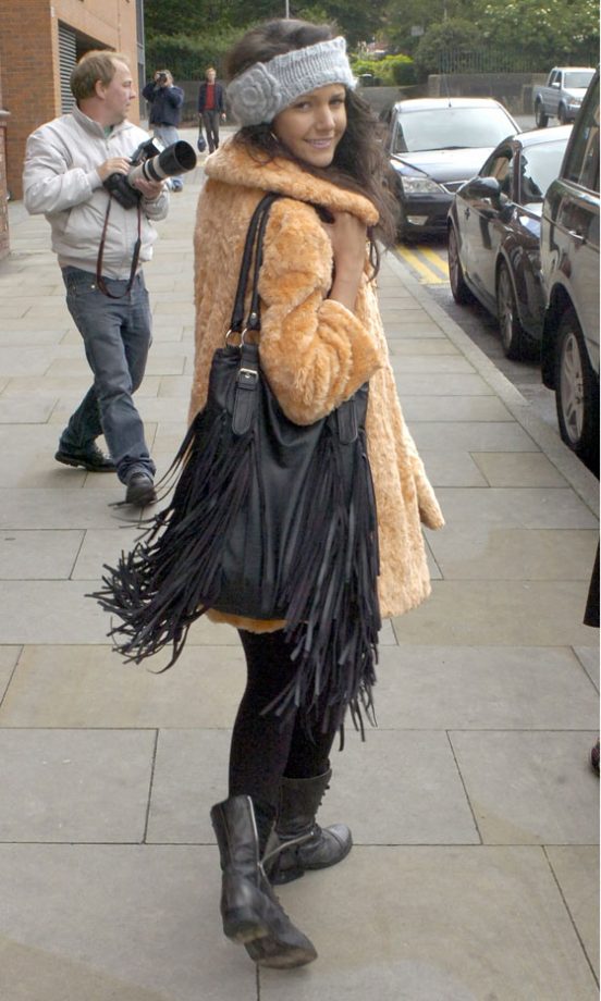 Michelle Keegan Covers Up In A Faux Fur Coat And Fringed Tote Bag Out And About In Manchester, 2009