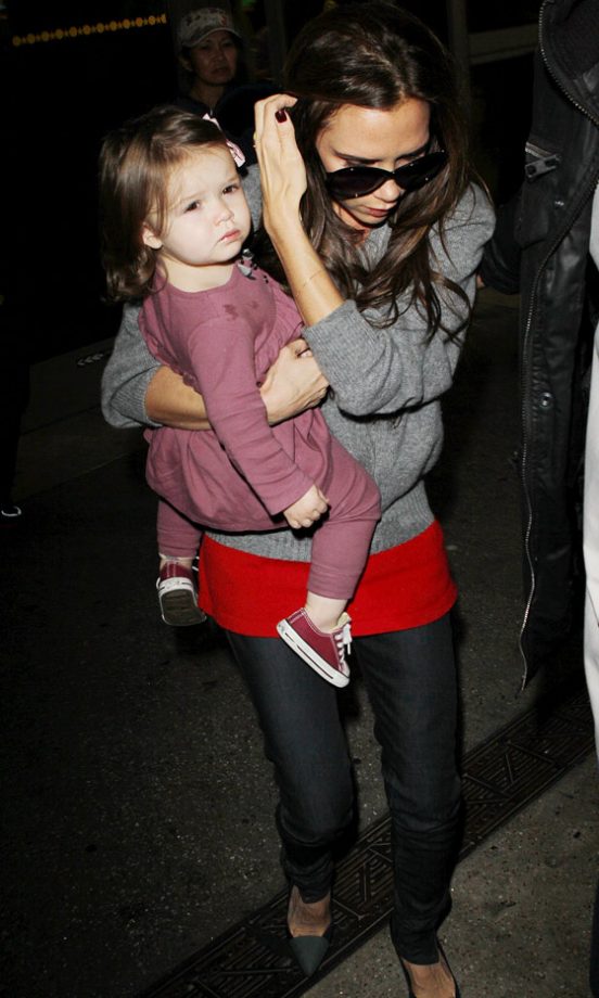 Victoria Beckham With Harper Beckham At LA International Airport, 2012