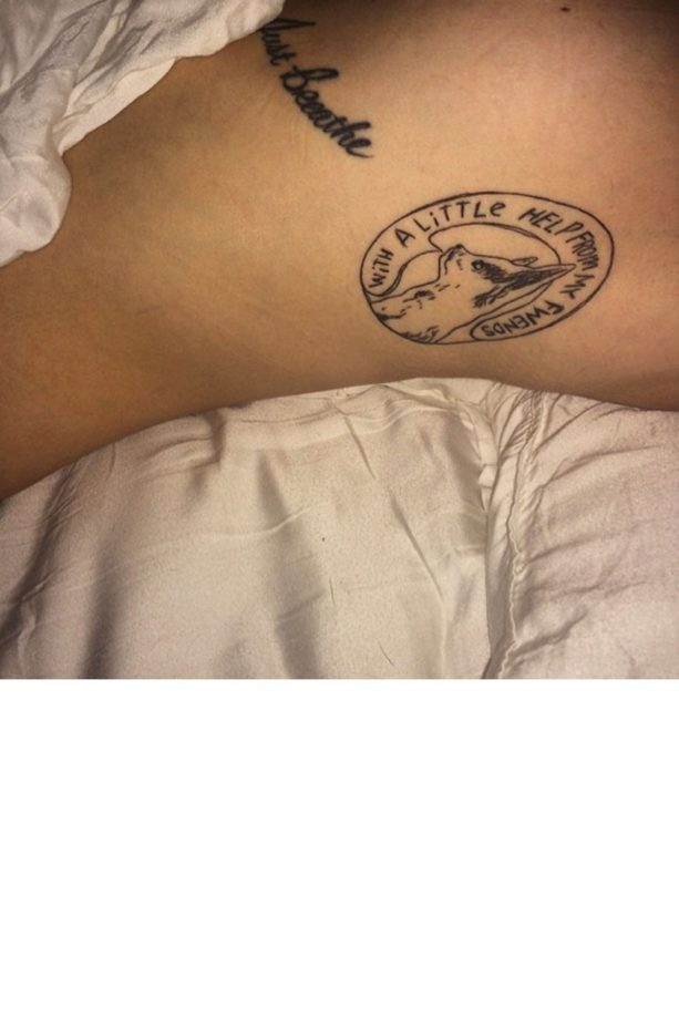 Miley Cyrus' Cat Tattoo, 2014