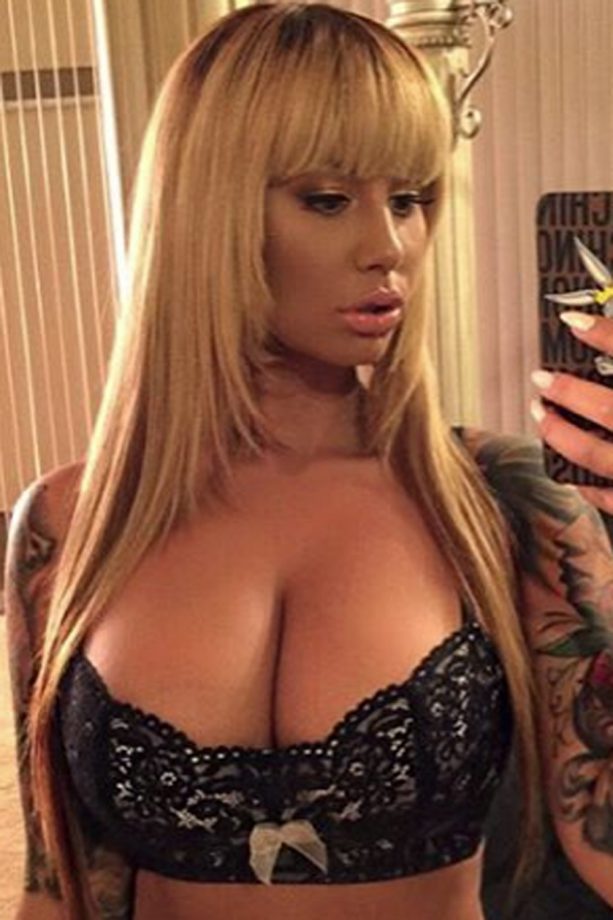 Amber Rose Swaps Her Famous Buzzcut For A Long, Blonde Wig, 2015