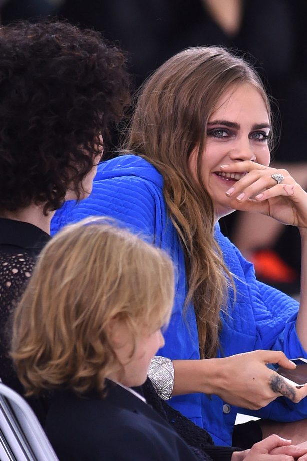 Cara Delevingne Gets Tongues Wagging With A Jewel On Her Ring Finger, 2015