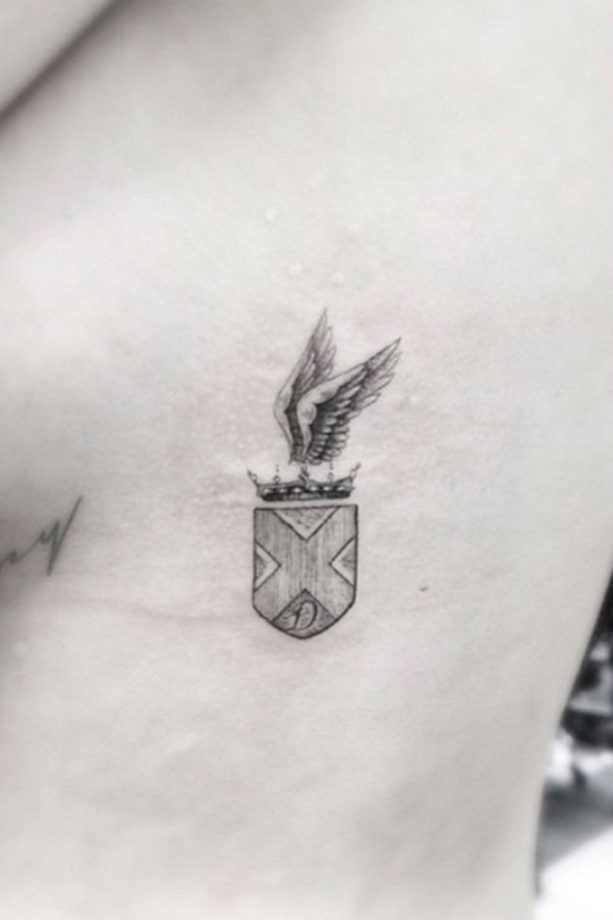 Cara Delevingne's Cute Coat Of Arms Tattoo, 2014