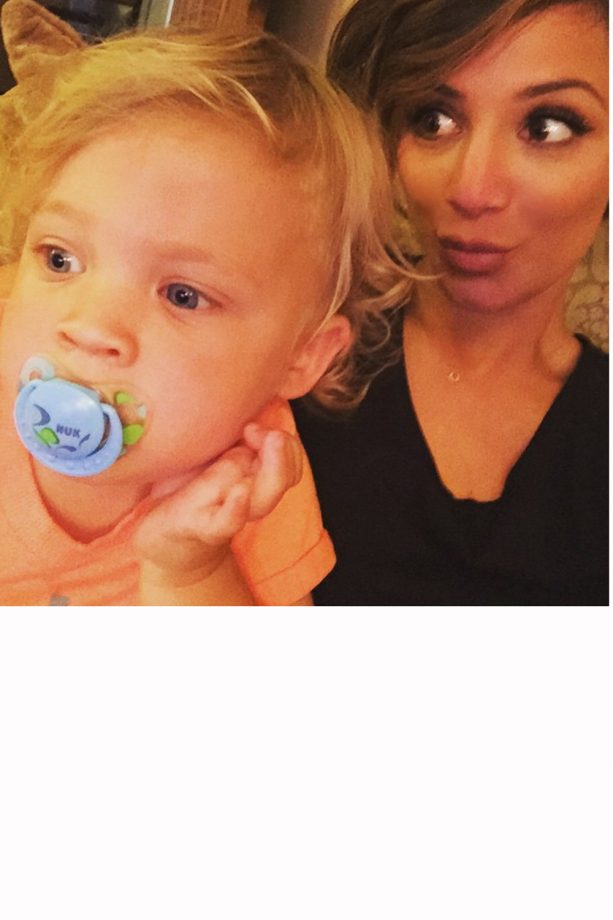 Frankie Bridge Takes A Selfie While Parker Plays Hard To Get, 2015
