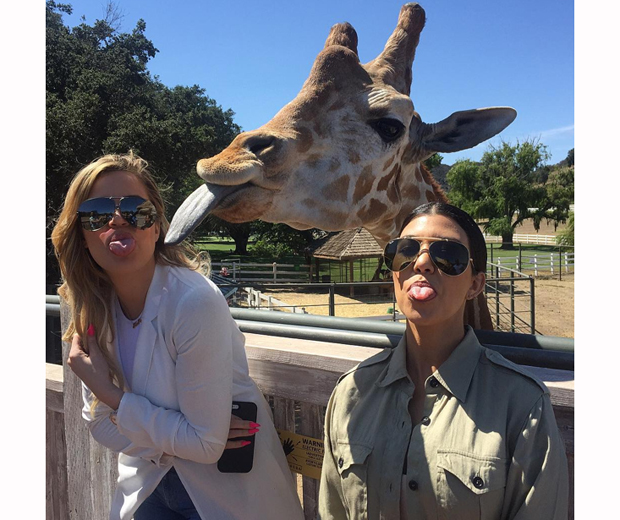 Khloe And Kourtney Kardashian Get Photobombed By A Giraffe, 2015
