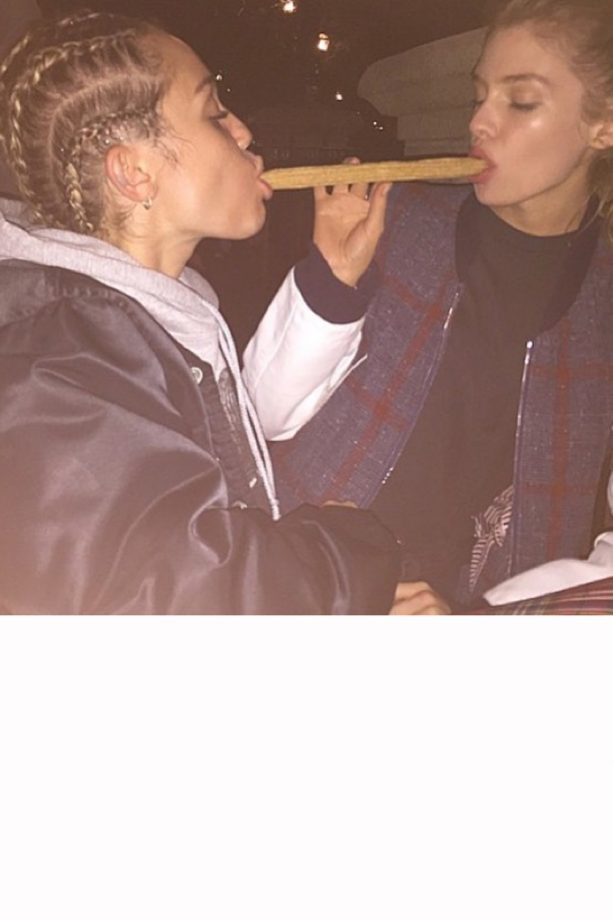 Miley Cyrus And Girlfriend Stella Maxwell Have A Lady And The Tramp Moment With A Churro, 2015