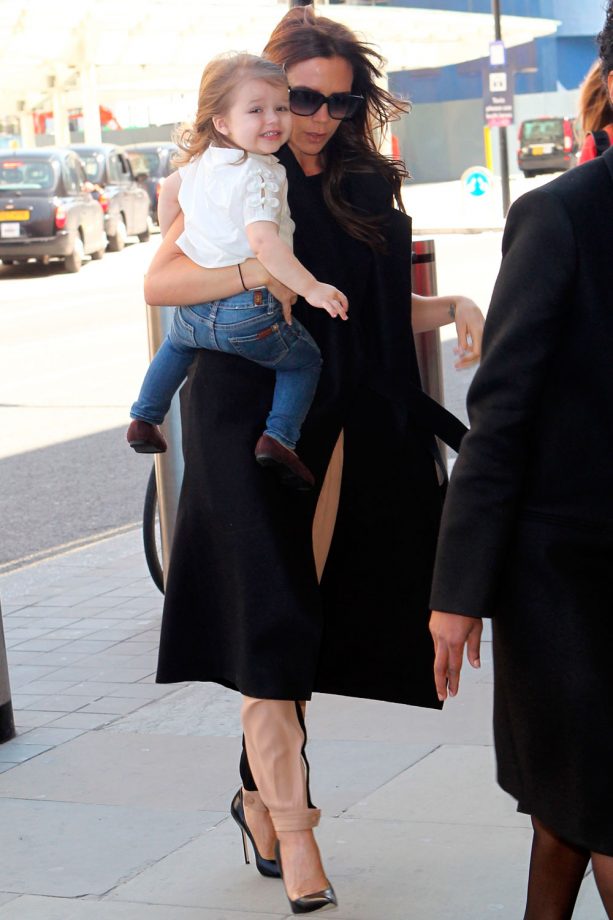 Victoria Beckham Carries Daughter Harper Out And About In London, 2013